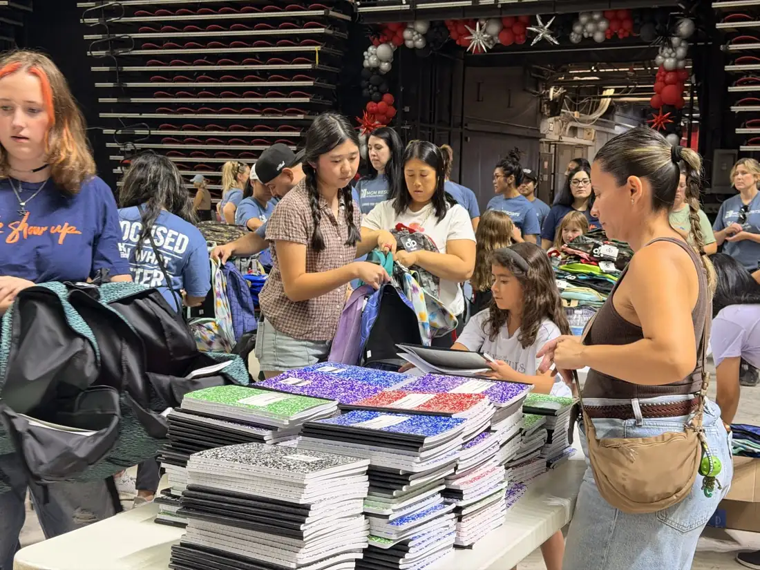 Students and volunteers along the packing line.